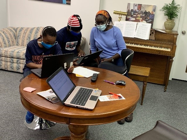 Two high school students learning at the African Resource Center